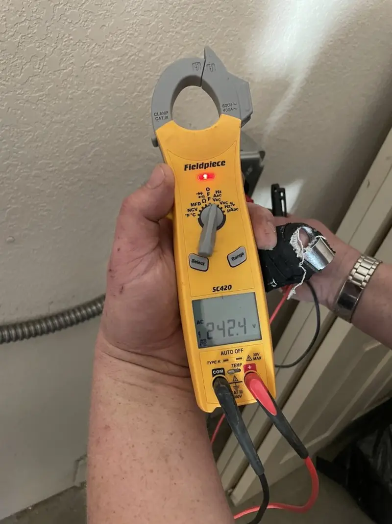 Voltage testing with clamp meter during Outlet Installation in Palos Verdes Estates